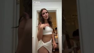 TikTok Upskirt No Panties white slit up leg party dress @tionnabadakai